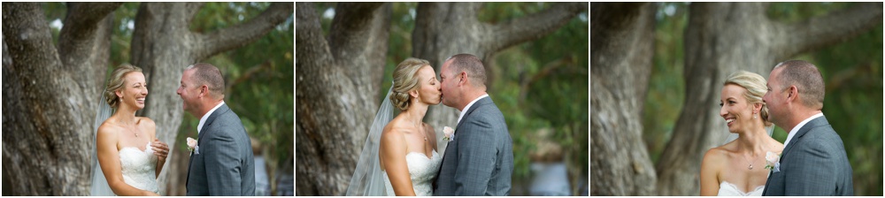 Bride and groom share a kiss