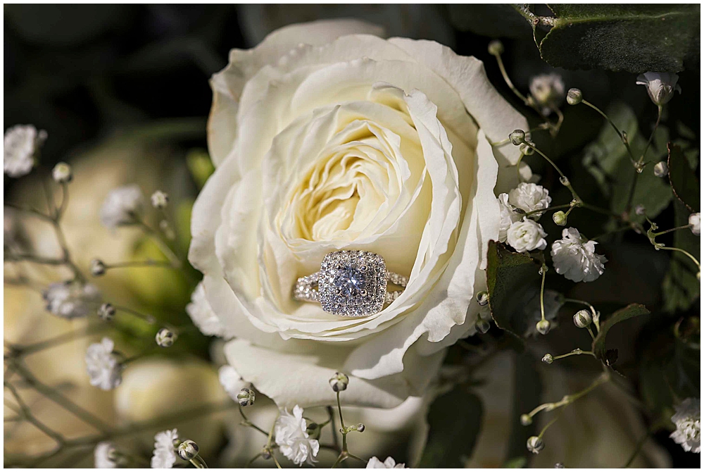 Engagement ring in wedding flowers