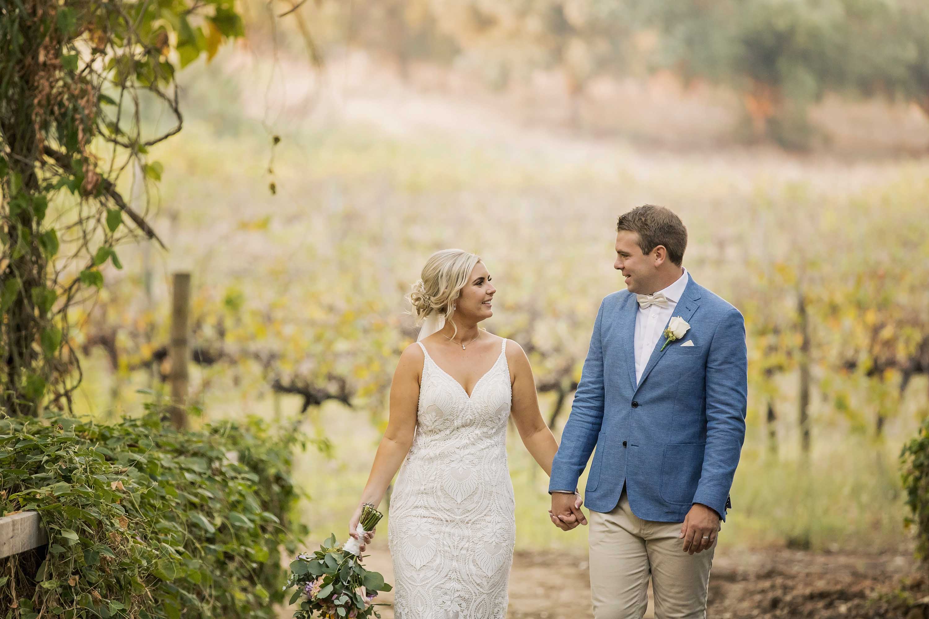 bride and groom in vineyards at Carilley Estate in Swan Valley